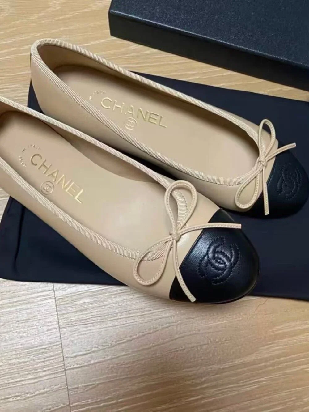 Chanel Beige Black Cap‑Toe CC Bow Leather Ballet Flats